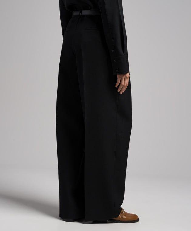 long relaxed wide leg pleated pant by Selfnex
