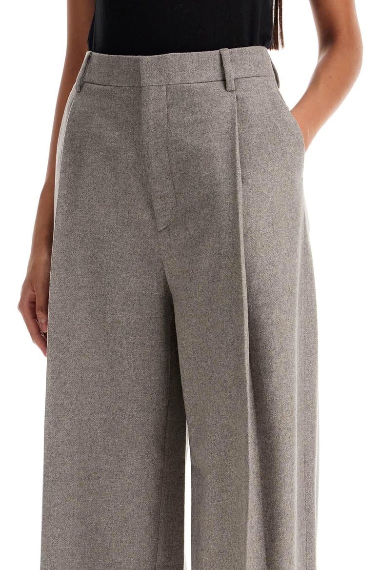wide pleated flannel trousers by Selfnex