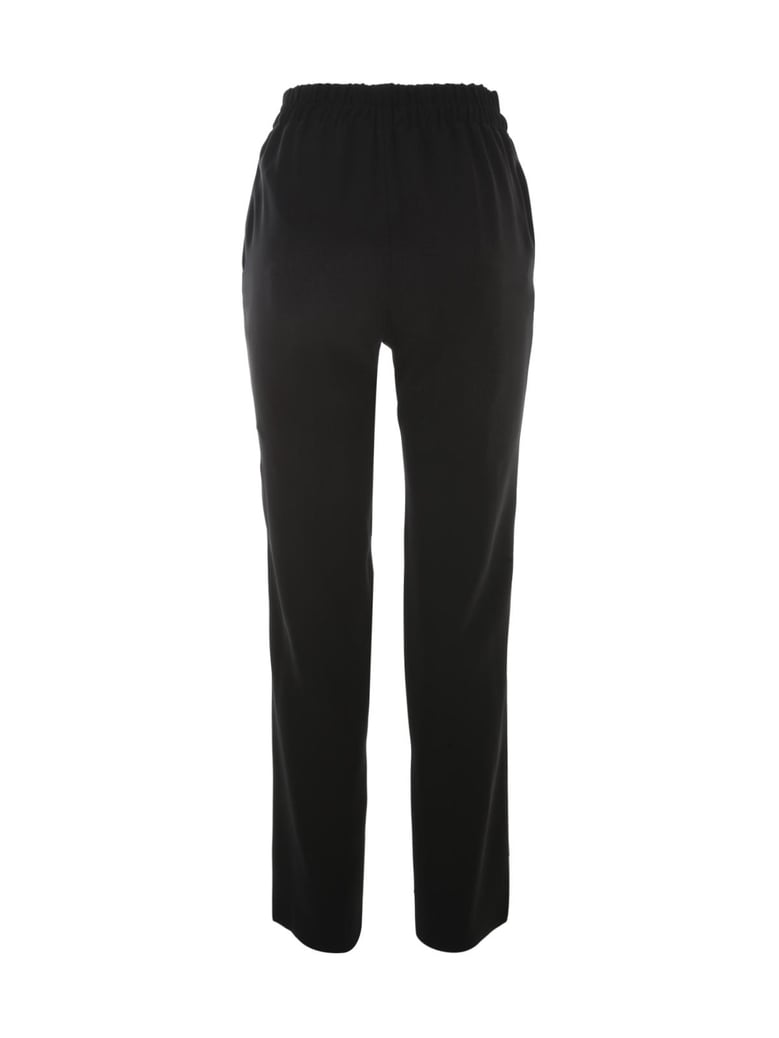 elastic waisted trousers with sartin details by Selfnex