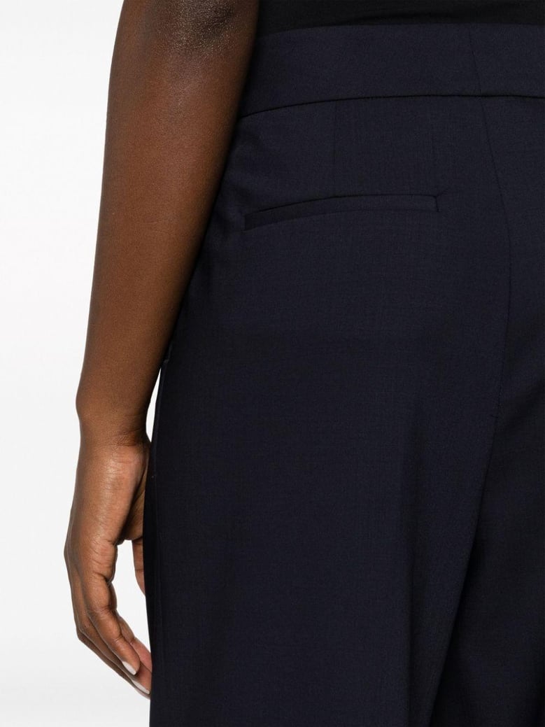 stretch wool trousers by Selfnex