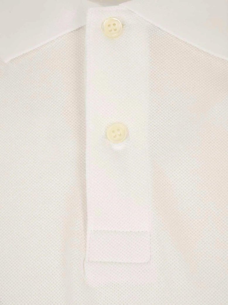 comme des garçons play red heart polo by Selfnex