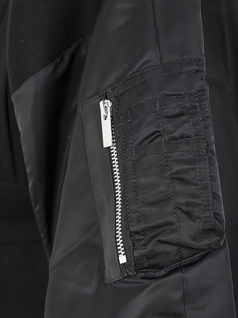 wool melton x nylon twill jacket by Selfnex