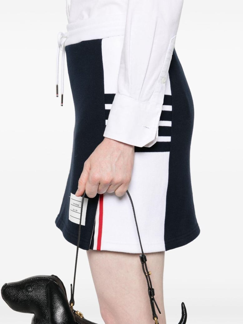 mini skirt w/ engineered 4 bar in blocked classic solid classic loopback jersey by Selfnex