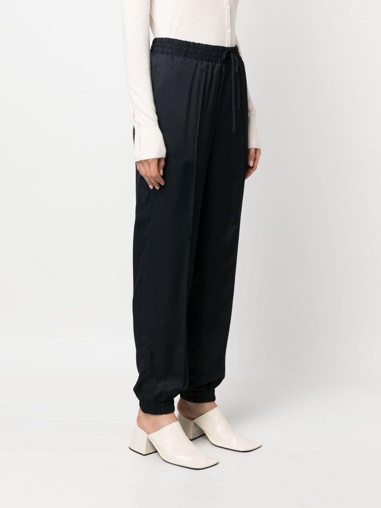 drawstring tapered trousers by Selfnex