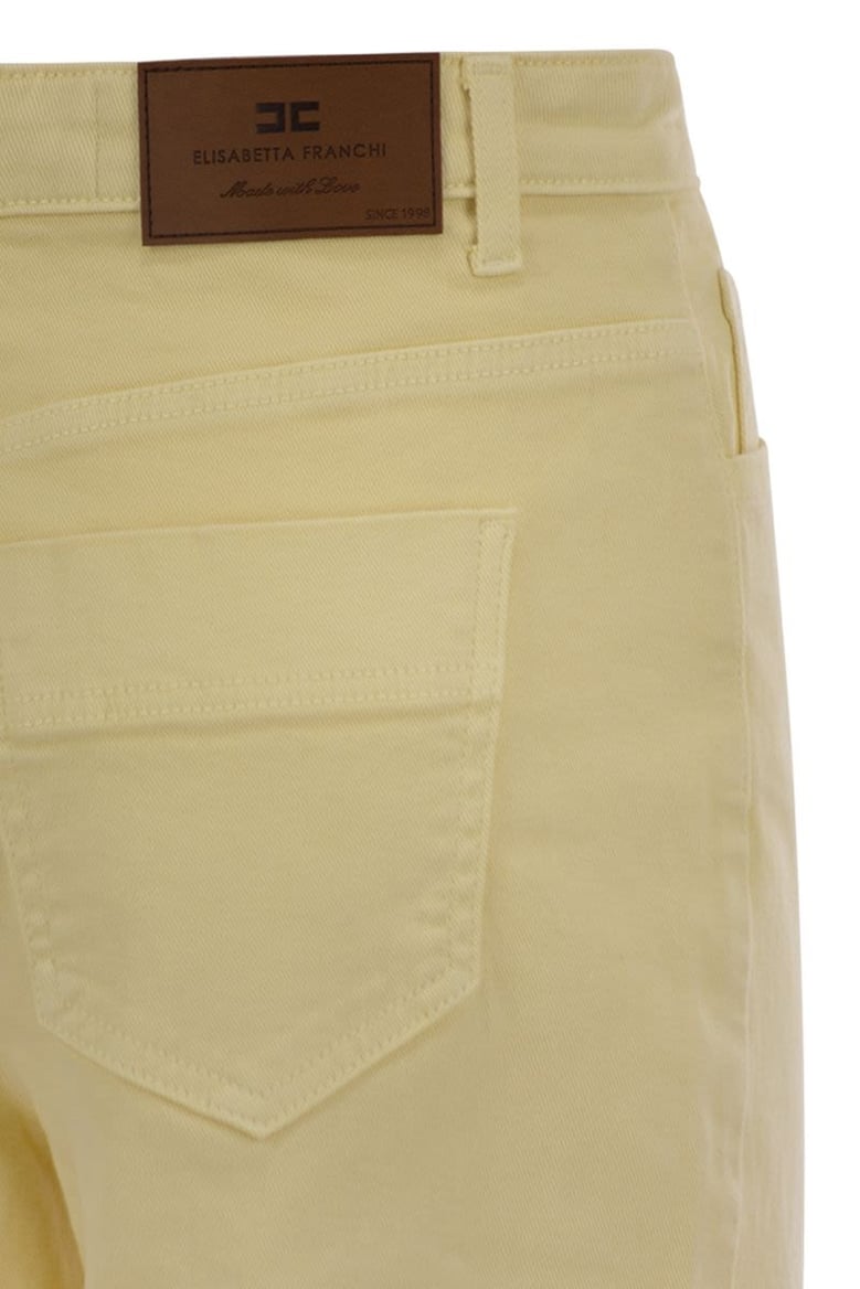 dyed cotton jeans with logo charm by Selfnex