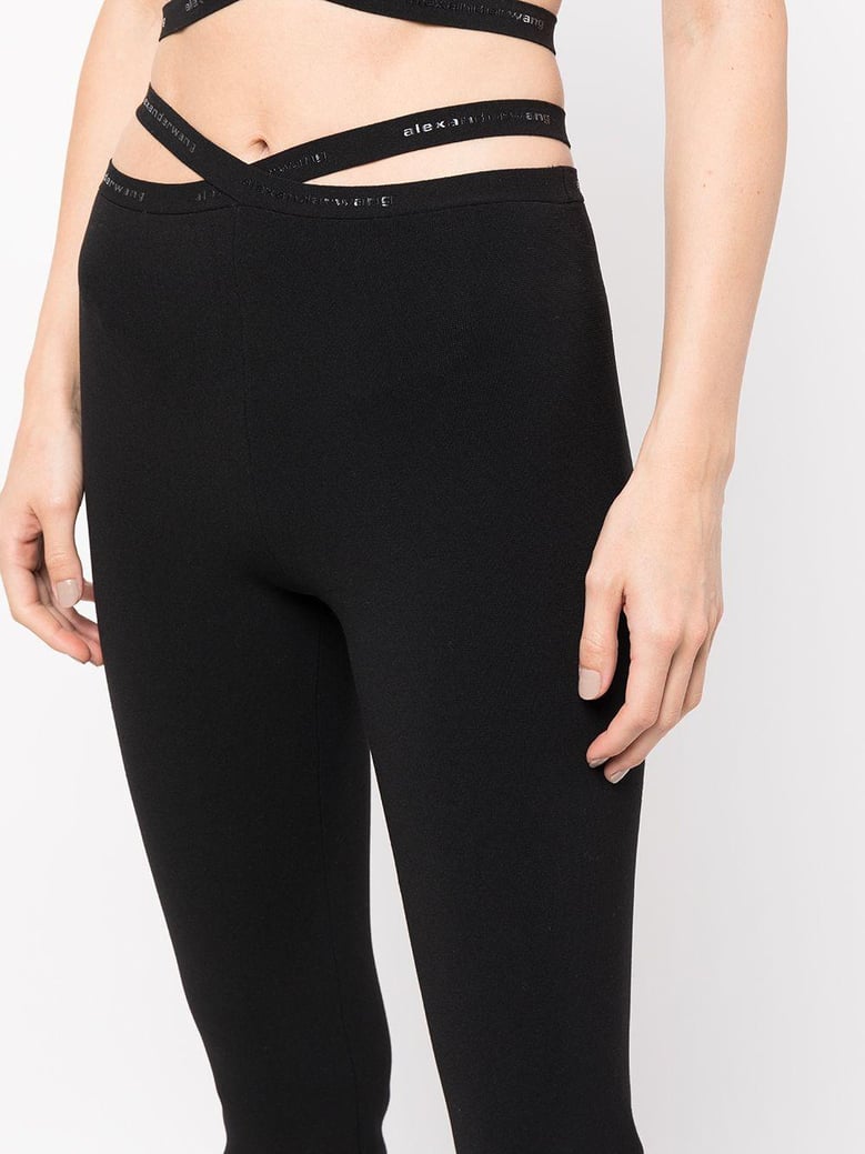 cross leggings with logo by Selfnex