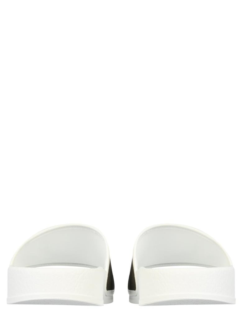 rubber slide sandals by Selfnex