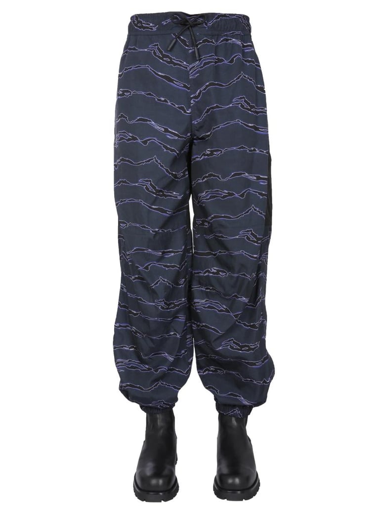 jogging pants with camou print by Selfnex