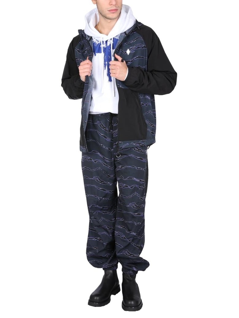 jogging pants with camou print by Selfnex
