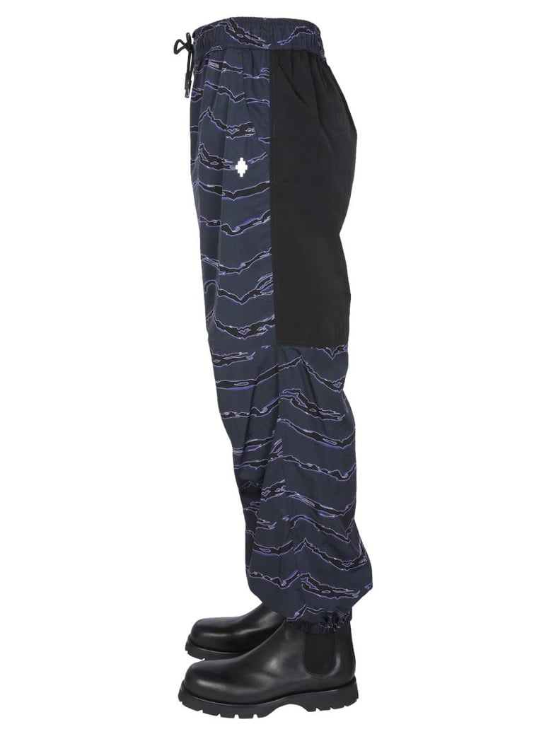 jogging pants with camou print by Selfnex