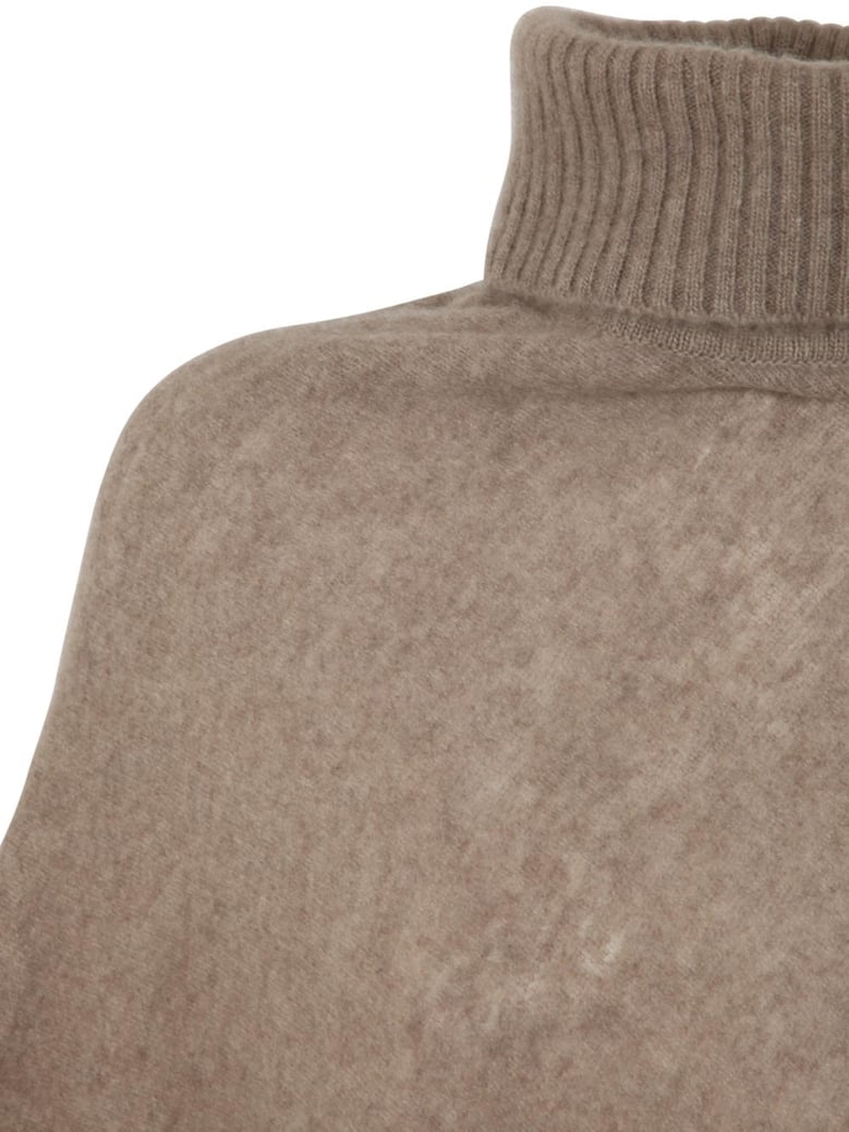 polo neck poncho by Selfnex