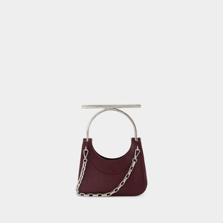 mini cross bar purse by Selfnex