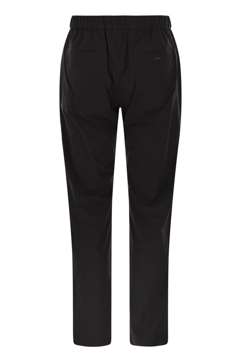 stretch nylon trousers by Selfnex