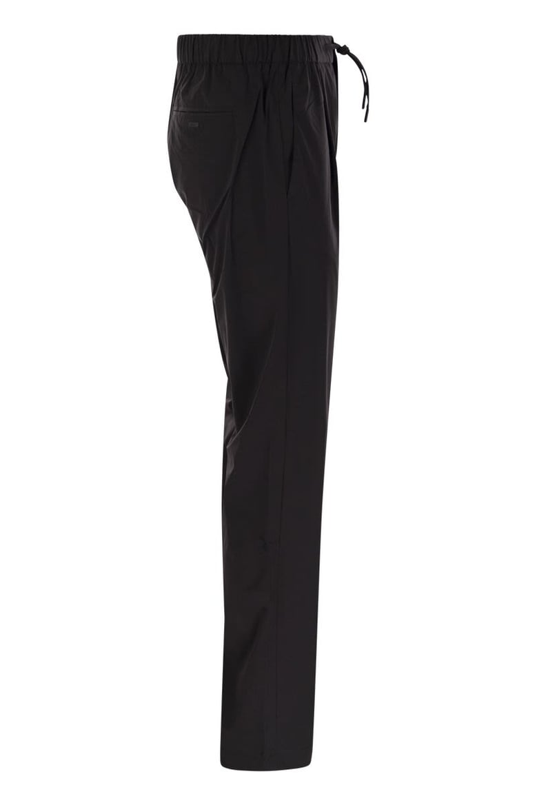 stretch nylon trousers by Selfnex