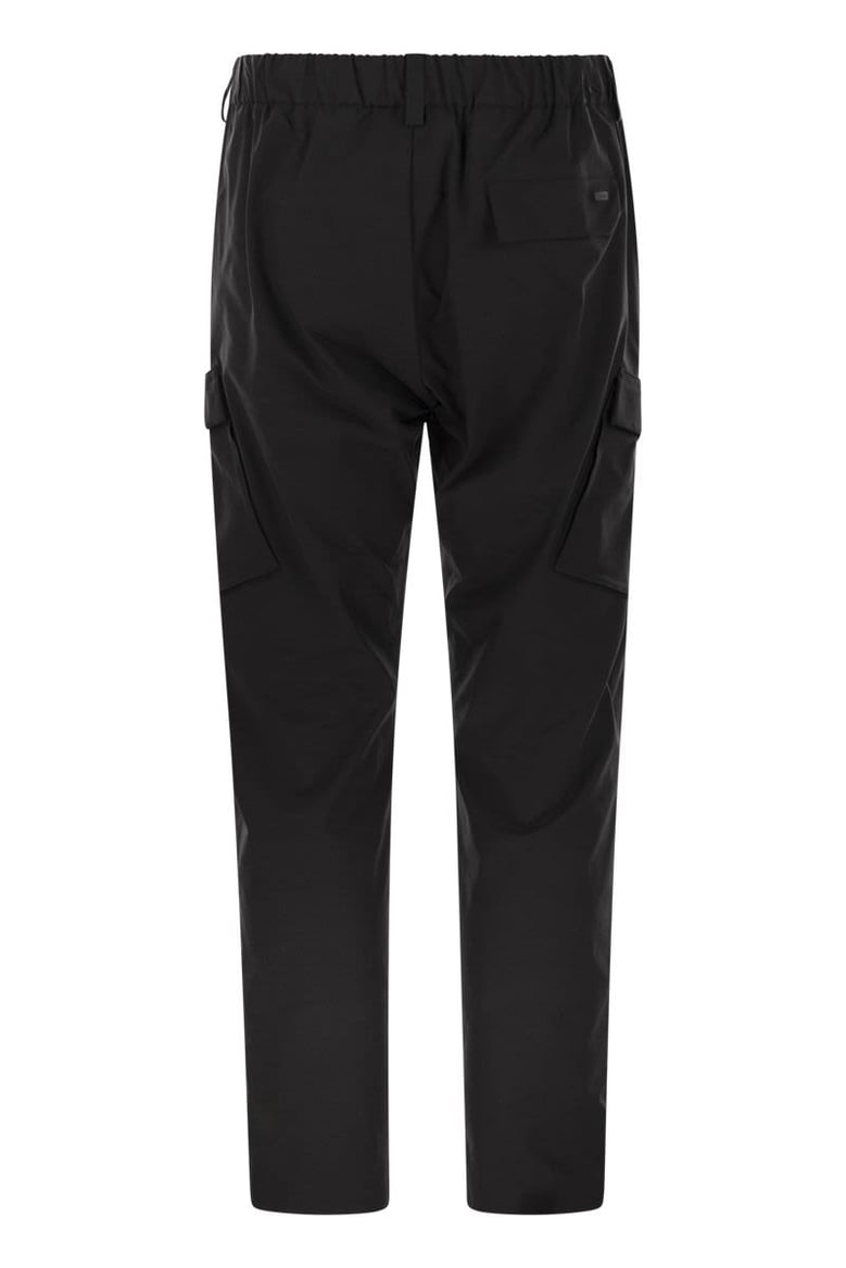 cargo trousers with mechanical stretch yarn by Selfnex