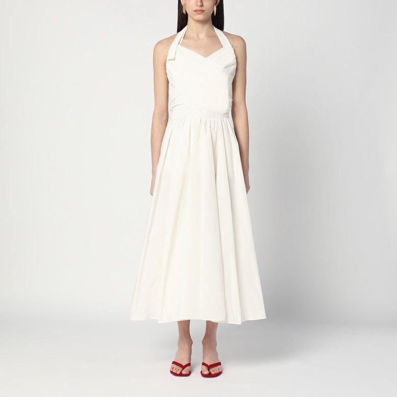 ivory dress with a bow on the back by Selfnex