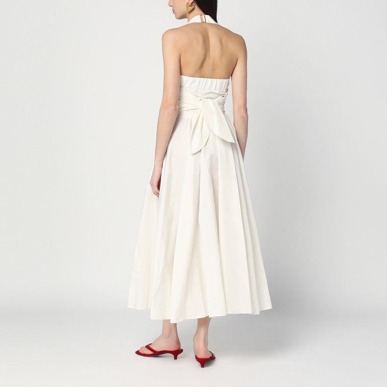 ivory dress with a bow on the back by Selfnex