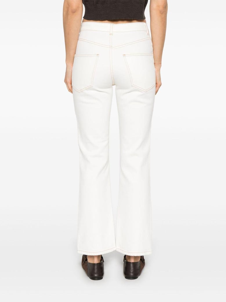 flared leg denim jeans by Selfnex