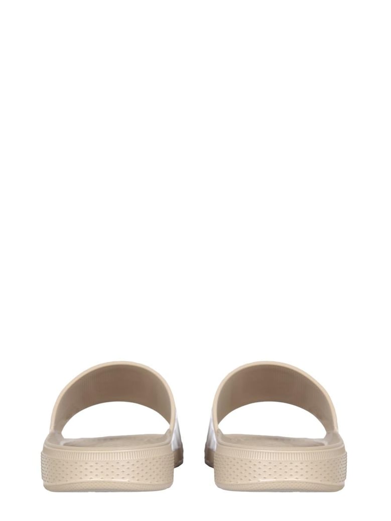 rubber slide sandals by Selfnex