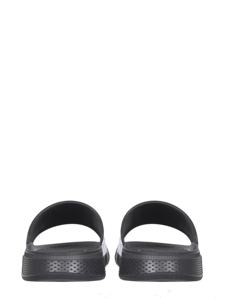 rubber slide sandals by Selfnex