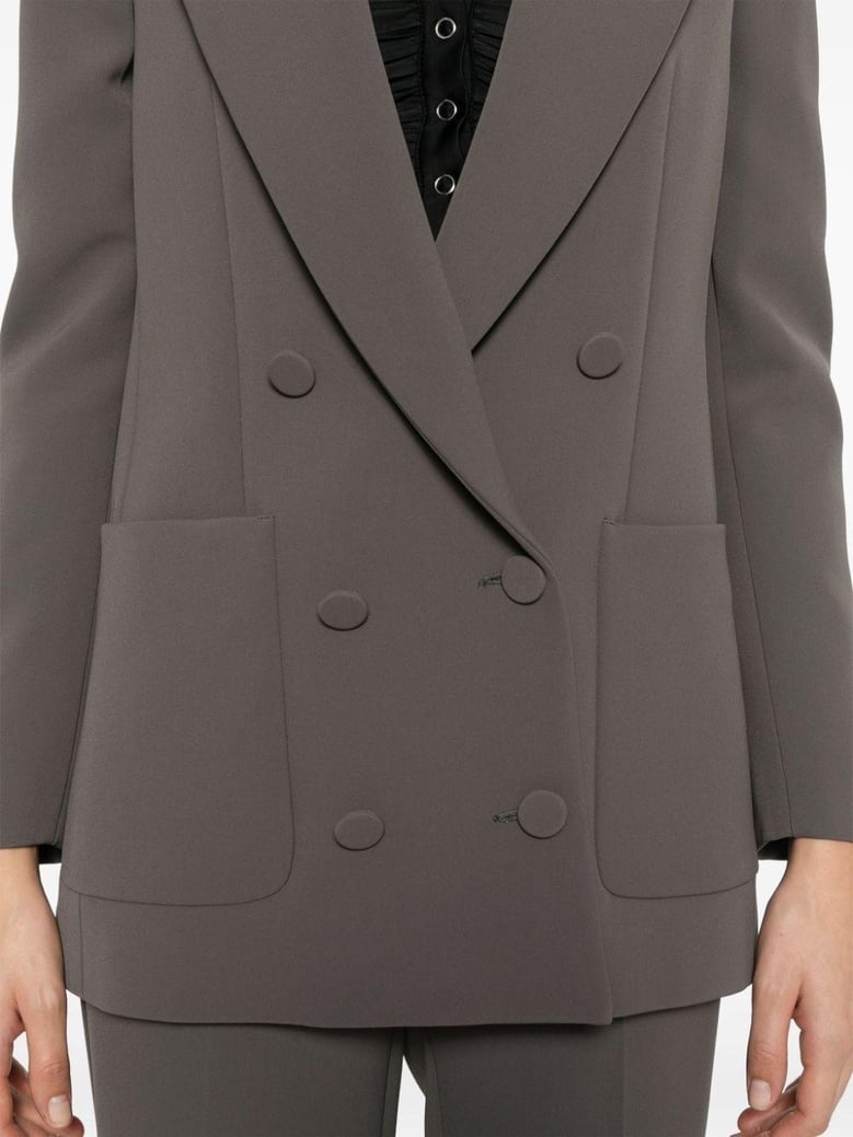 over double breasted coat by Selfnex