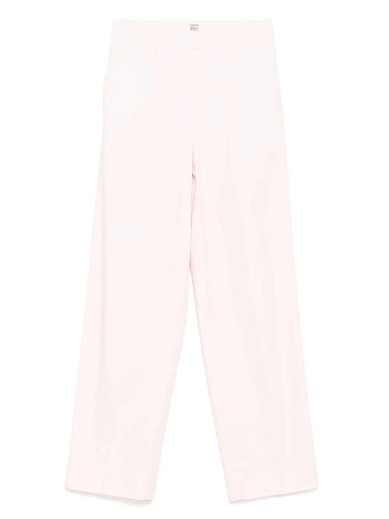 slanted pocket trousers by Selfnex