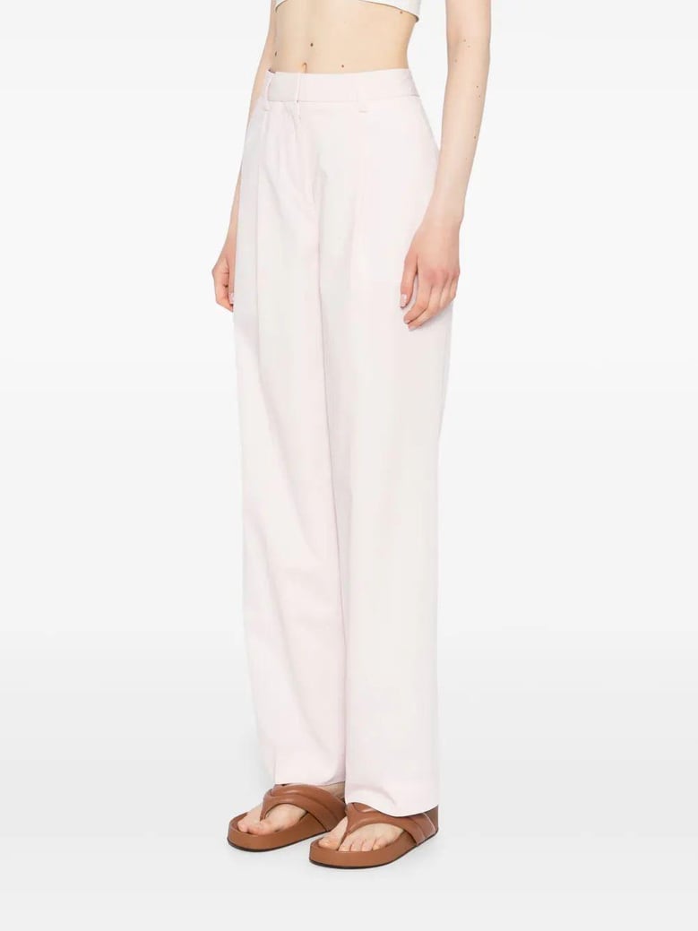 slanted pocket trousers by Selfnex