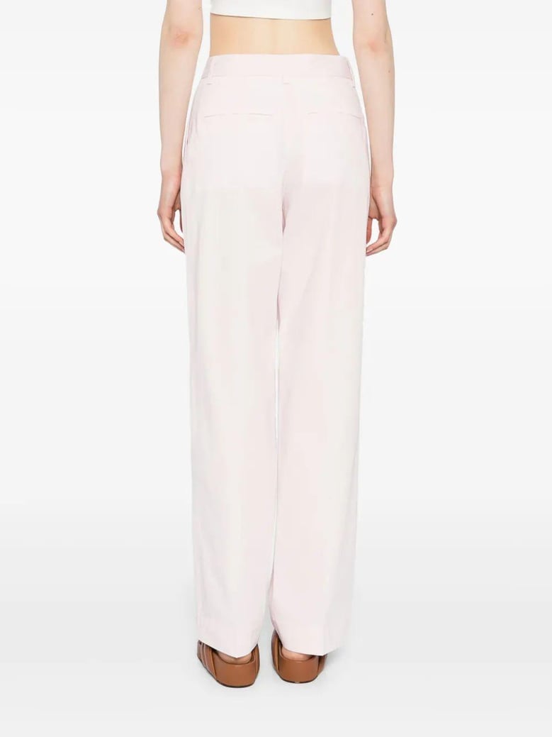 slanted pocket trousers by Selfnex