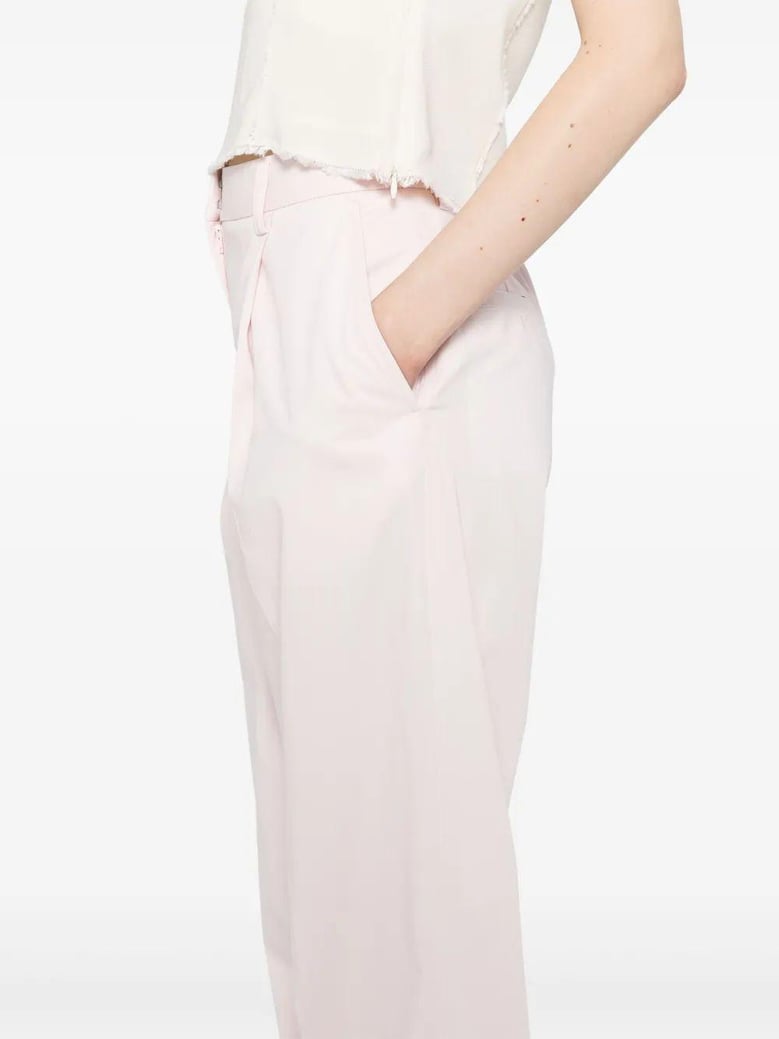 slanted pocket trousers by Selfnex