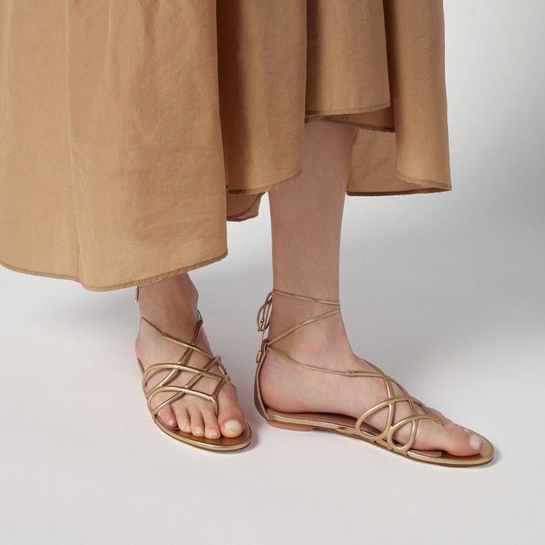 low gold leather sandal by Selfnex
