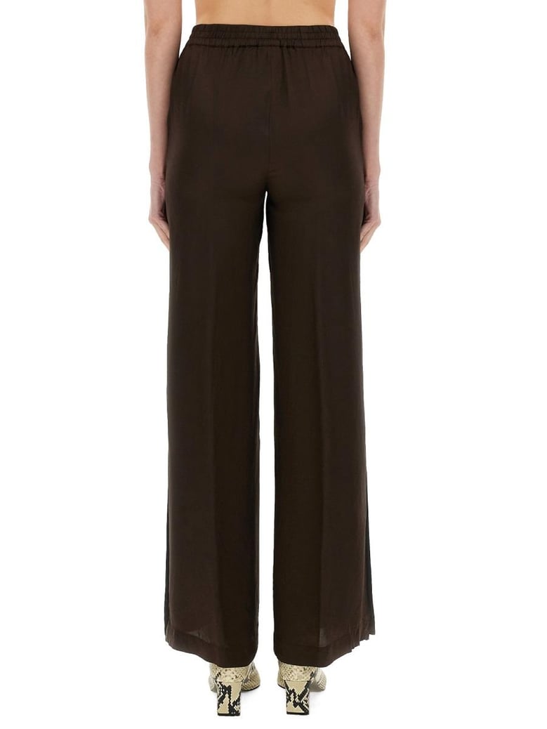viscose trousers in brown by Selfnex