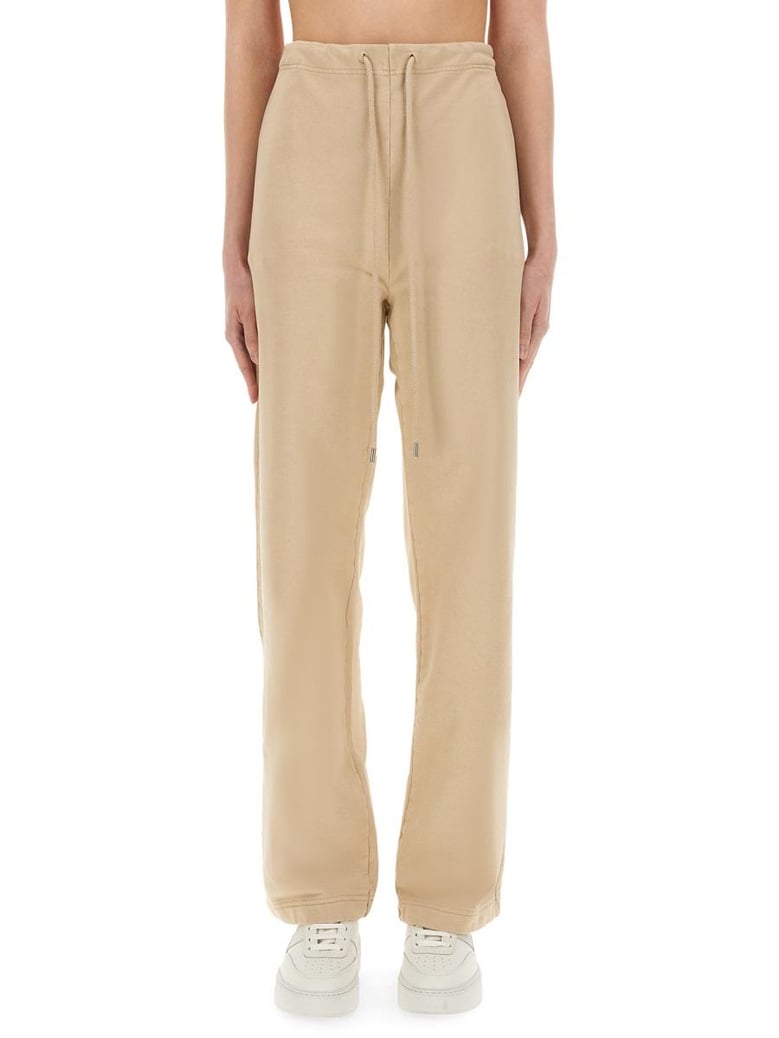 beige cotton trousers by Selfnex