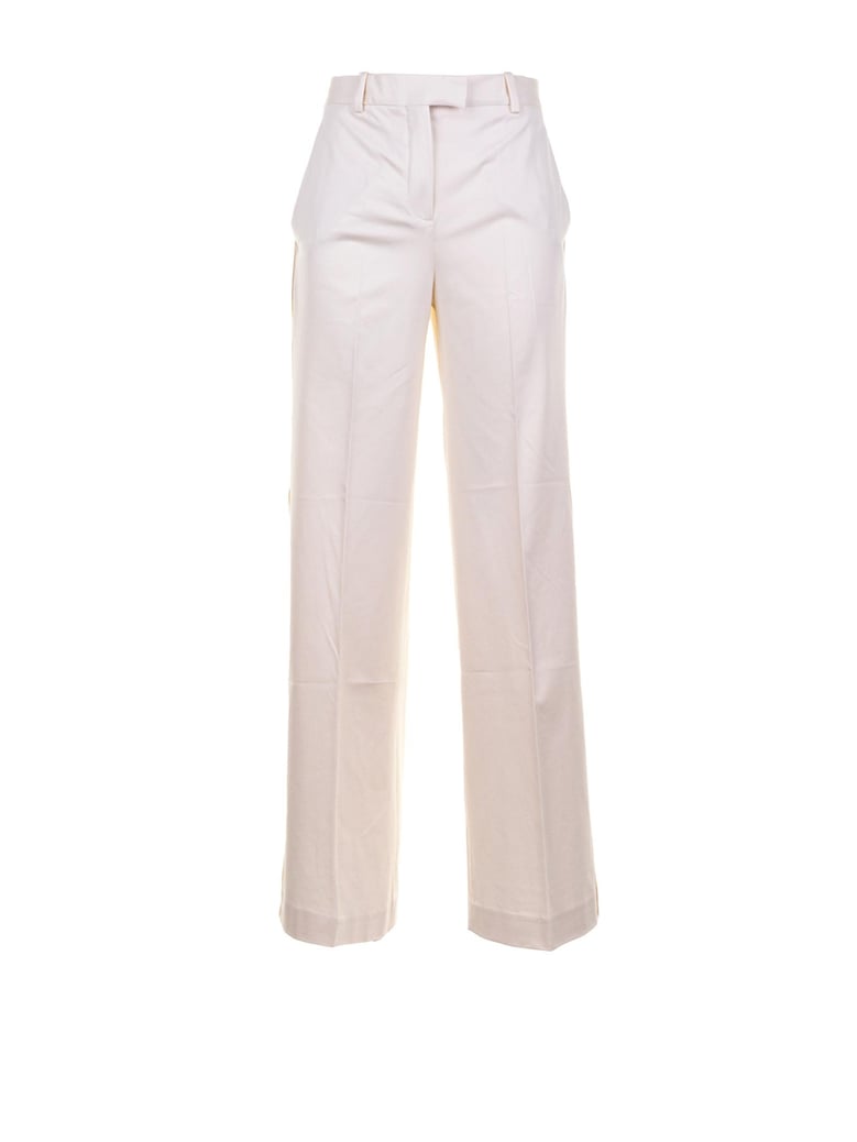 high-waisted jersey trousers by Selfnex