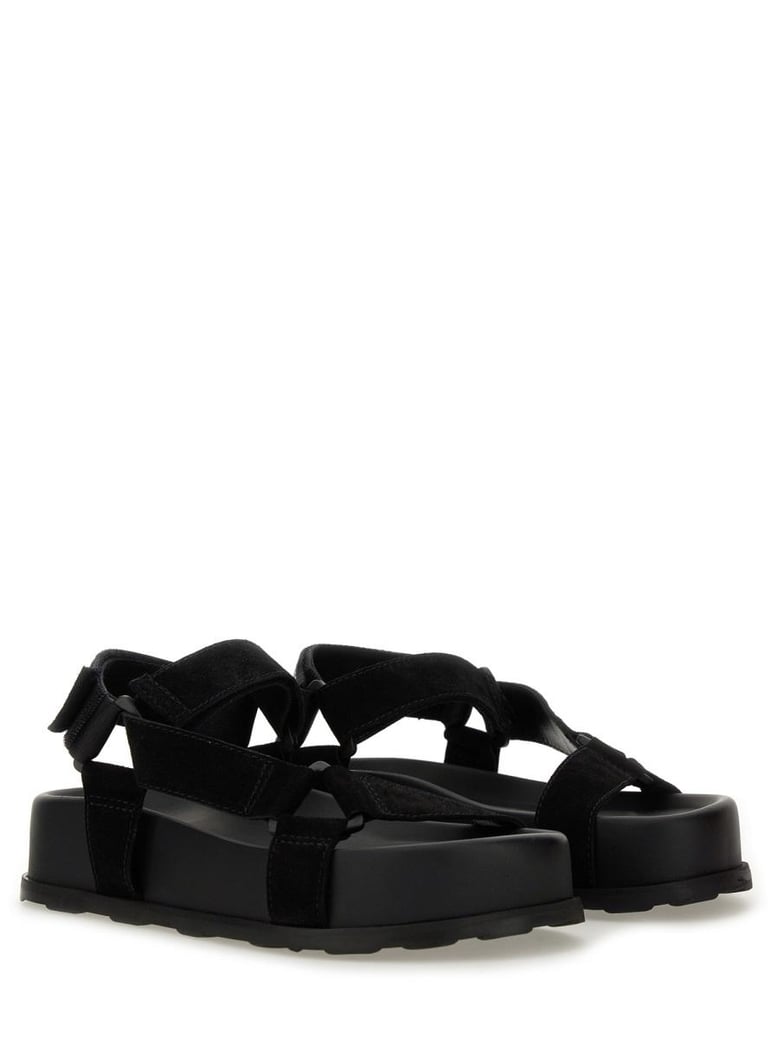 black leather sandals by Selfnex