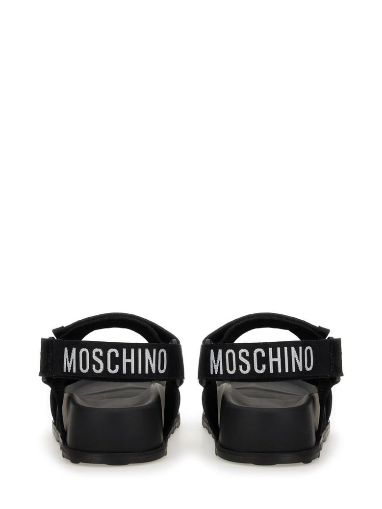 black leather sandals by Selfnex