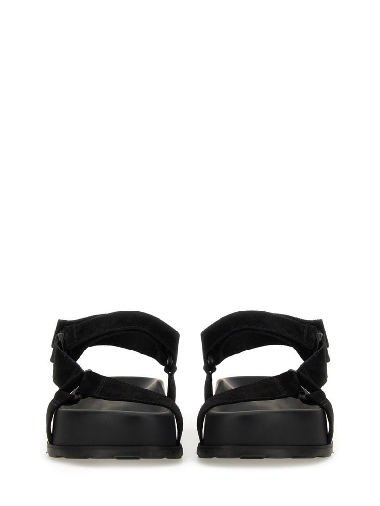 black leather sandals by Selfnex