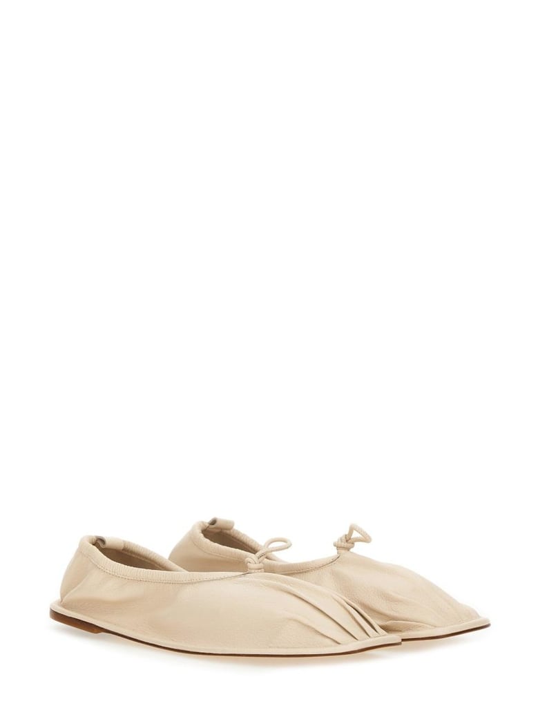 beige leather flats by Selfnex
