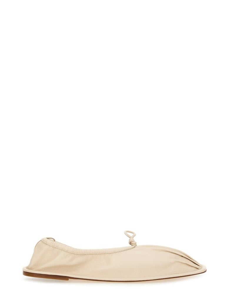 beige leather flats by Selfnex