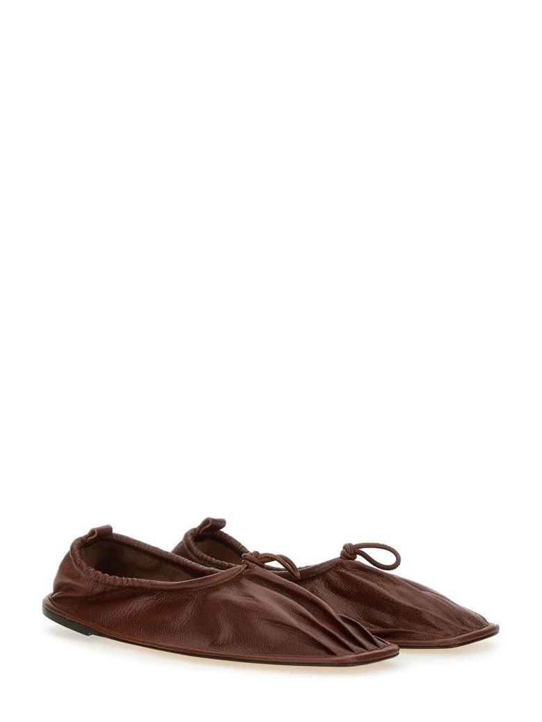 brown leather flats by Selfnex