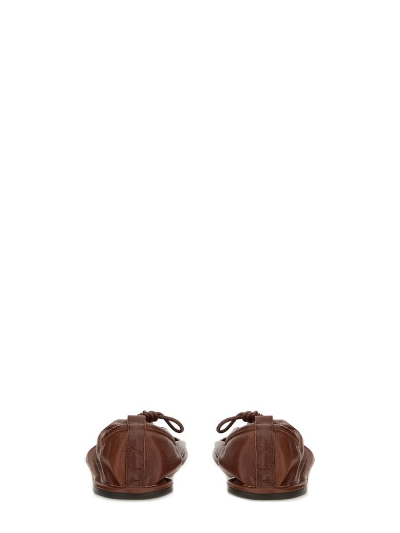 brown leather flats by Selfnex
