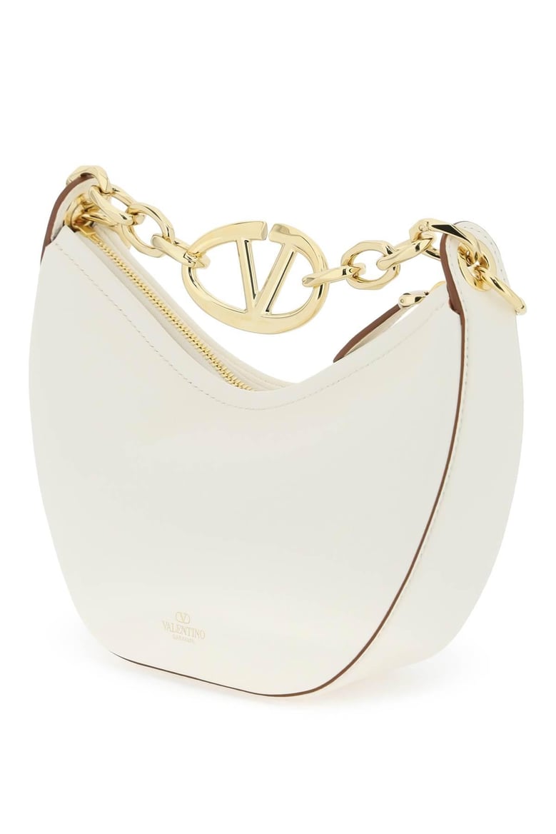 ivory leather mini hobo vlogo moon handbag by Selfnex