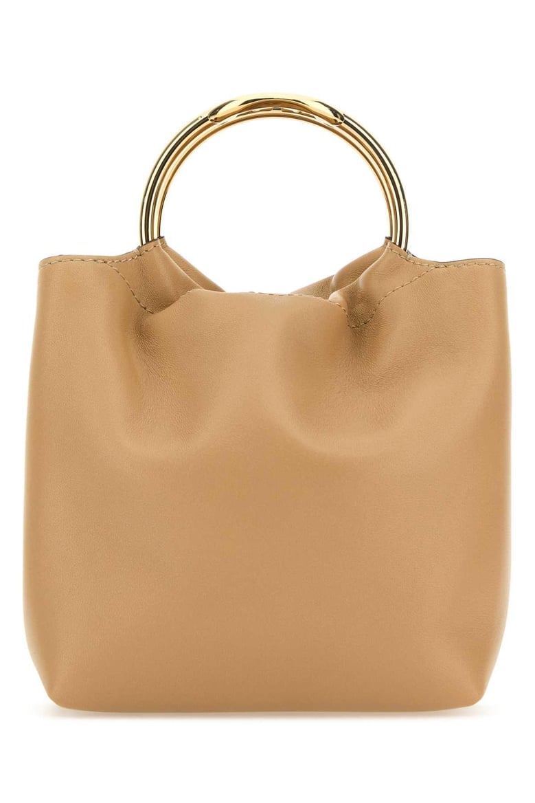 beige leather bucket bag by Selfnex