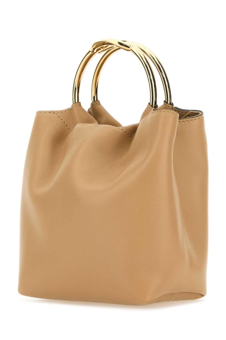 beige leather bucket bag by Selfnex