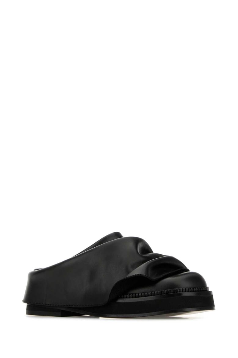 black leather mini robin slippers by Selfnex