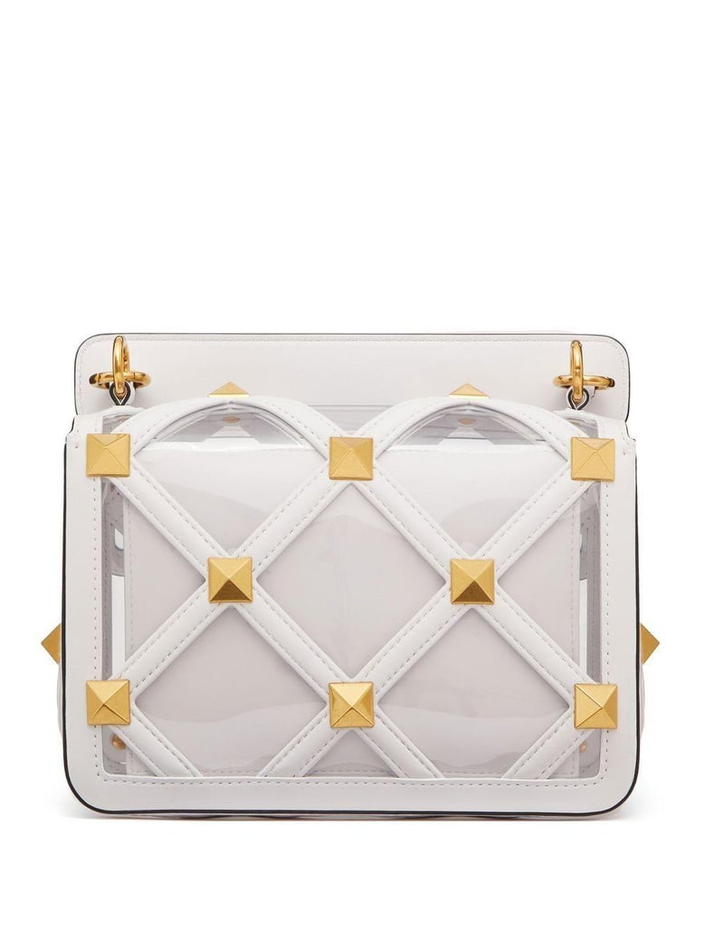 pastel pink polymeric material and leather medium roman stud handbag by Selfnex