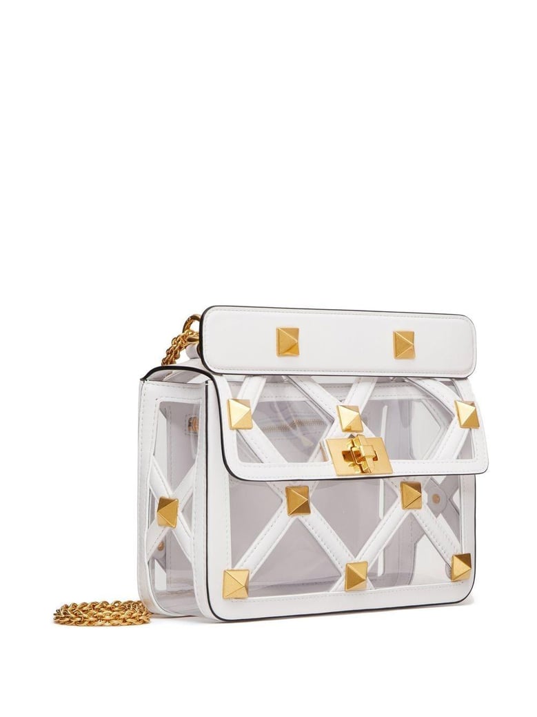 pastel pink polymeric material and leather medium roman stud handbag by Selfnex