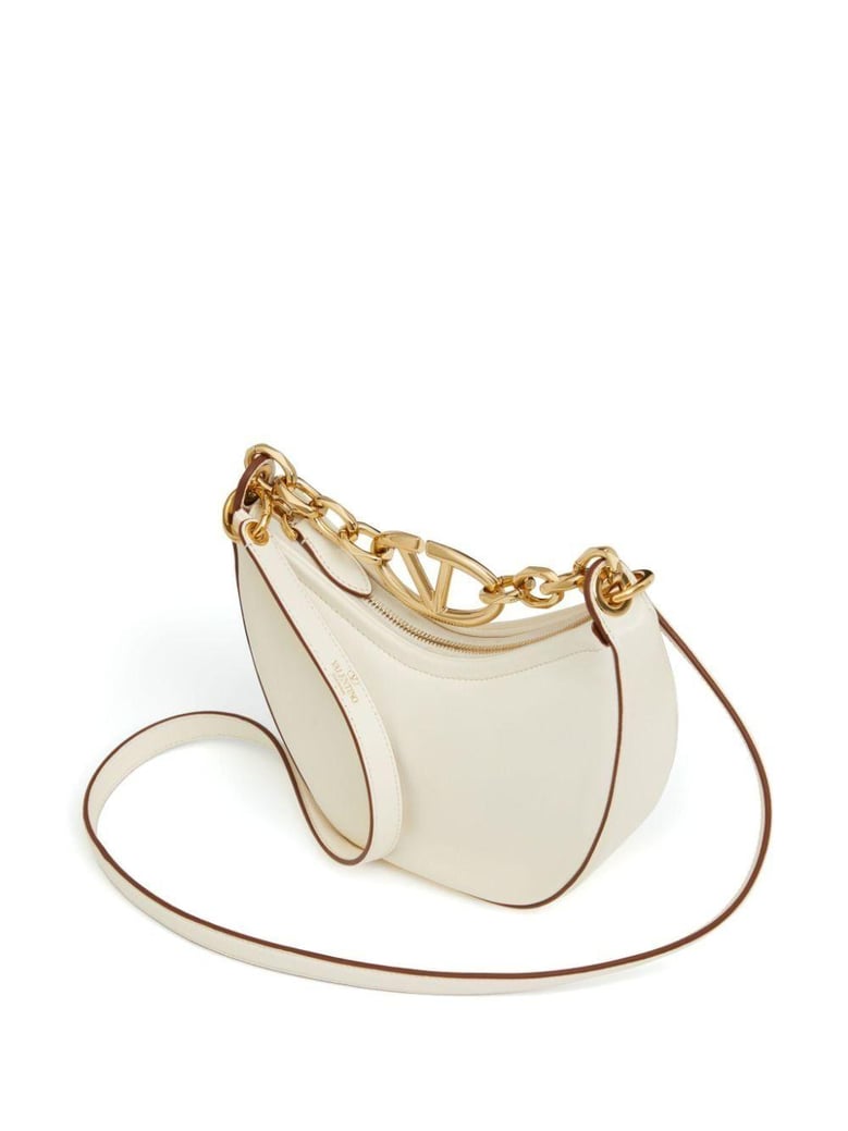 ivory leather mini hobo vlogo moon handbag by Selfnex