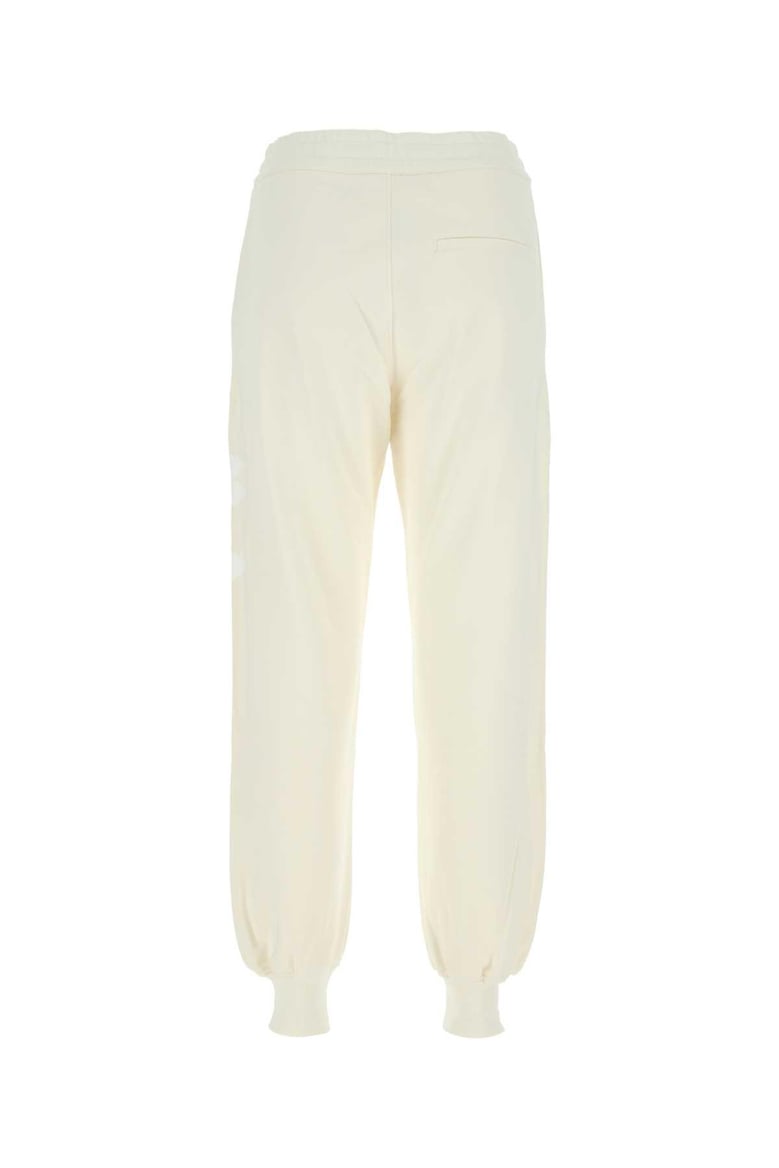 ivory cotton joggers by Selfnex
