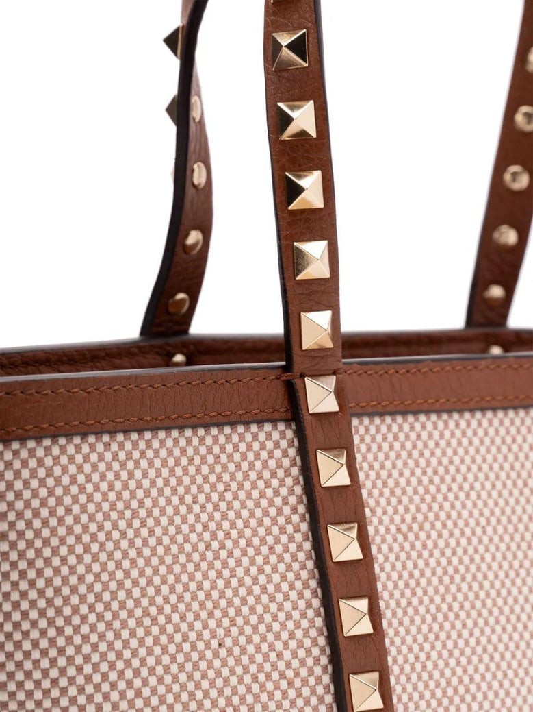 two-tone canvas medium rockstud handbag by Selfnex