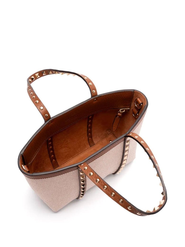 two-tone canvas medium rockstud handbag by Selfnex